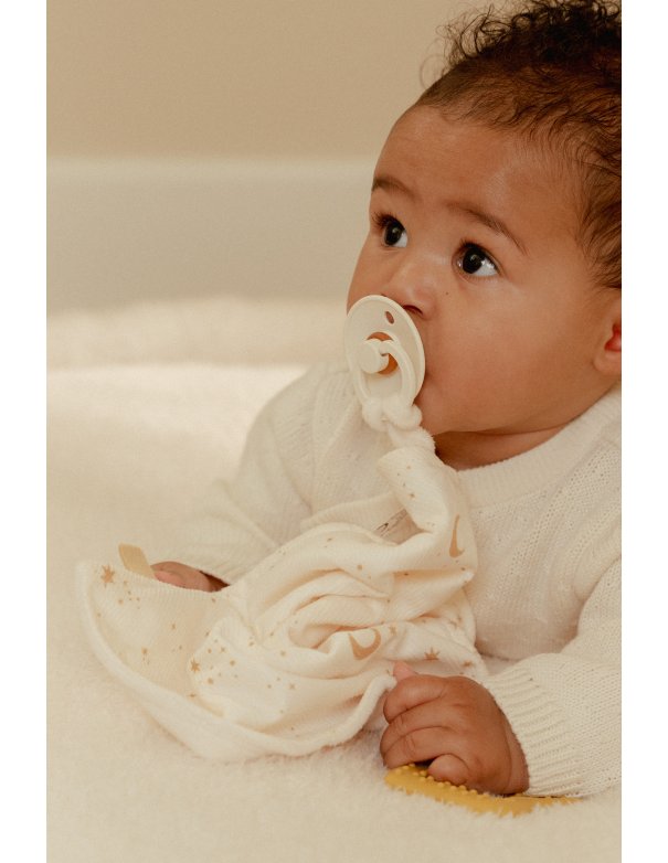 Doudou avec jouet de dentition étoile... Doudou avec jouet de dentition étoile...