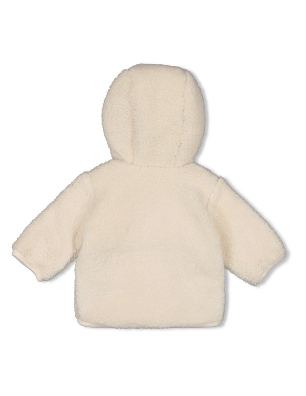 Veste réversible en peluche avec... Veste réversible en peluche avec...