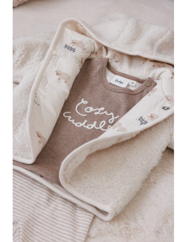 Veste réversible en peluche avec... Veste réversible en peluche avec...