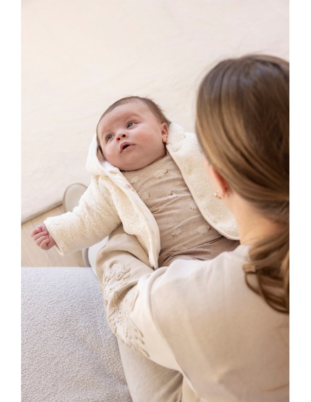Veste réversible en peluche avec... Veste réversible en peluche avec...
