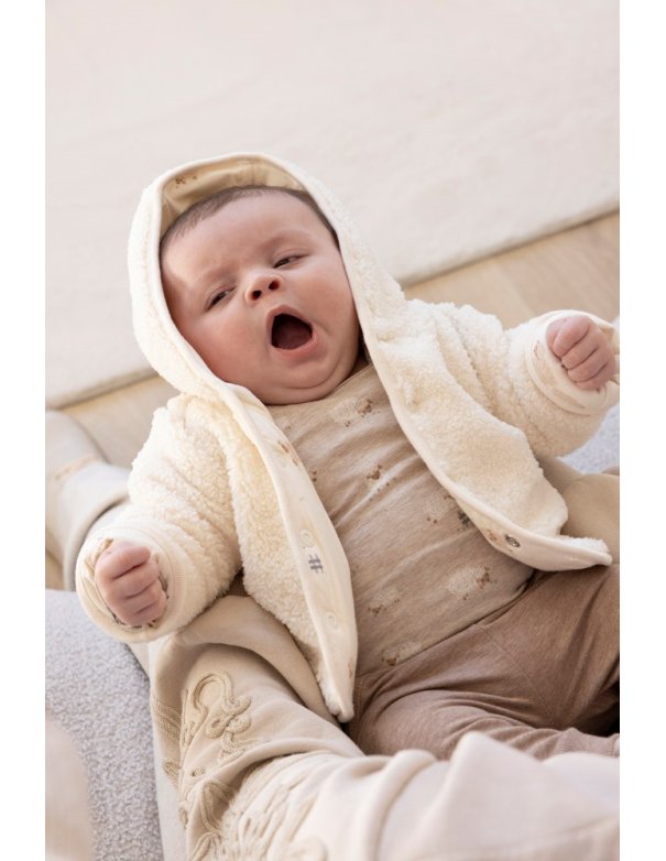 Veste réversible en peluche avec... Veste réversible en peluche avec...
