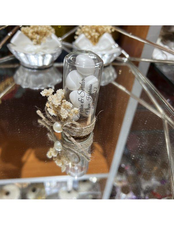 Dragée en fiole en verre