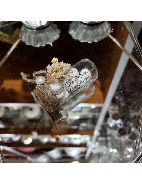 Dragée en fiole en verre